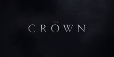 The Crown title card: grey all-capital letters on a black smoky background.